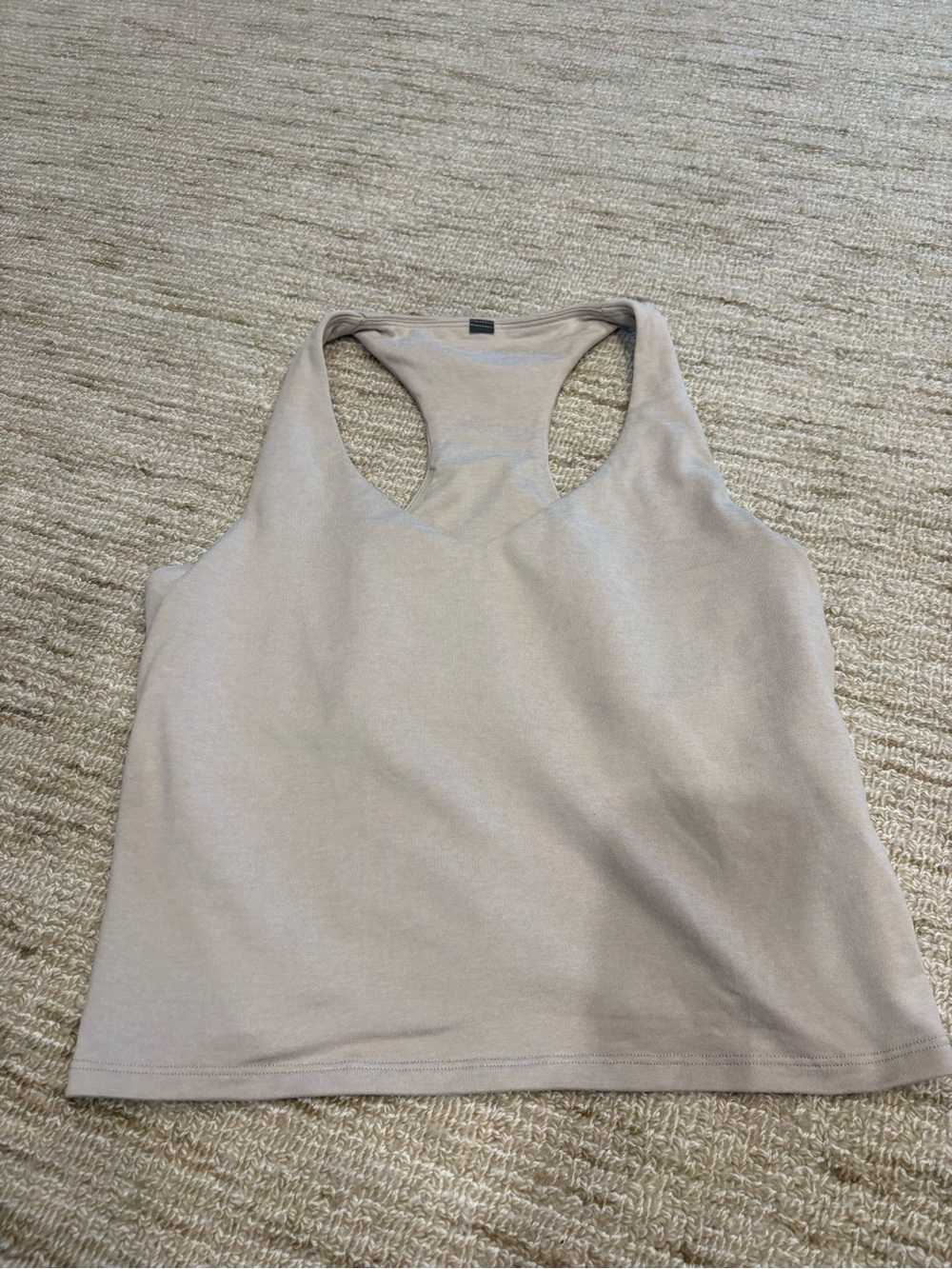 Vuori Neutral Racerback Tank in Light Taupe